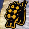 Three-headed Cat “Dahlia Neko” Rug (Black) Three-headed Cat “Dahlia Neko” Rug (Black)