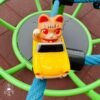 Tabby cat yellow car Tabby cat yellow car