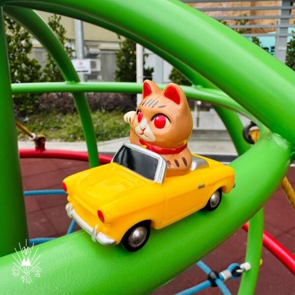 Tabby cat yellow car Tabby cat yellow car